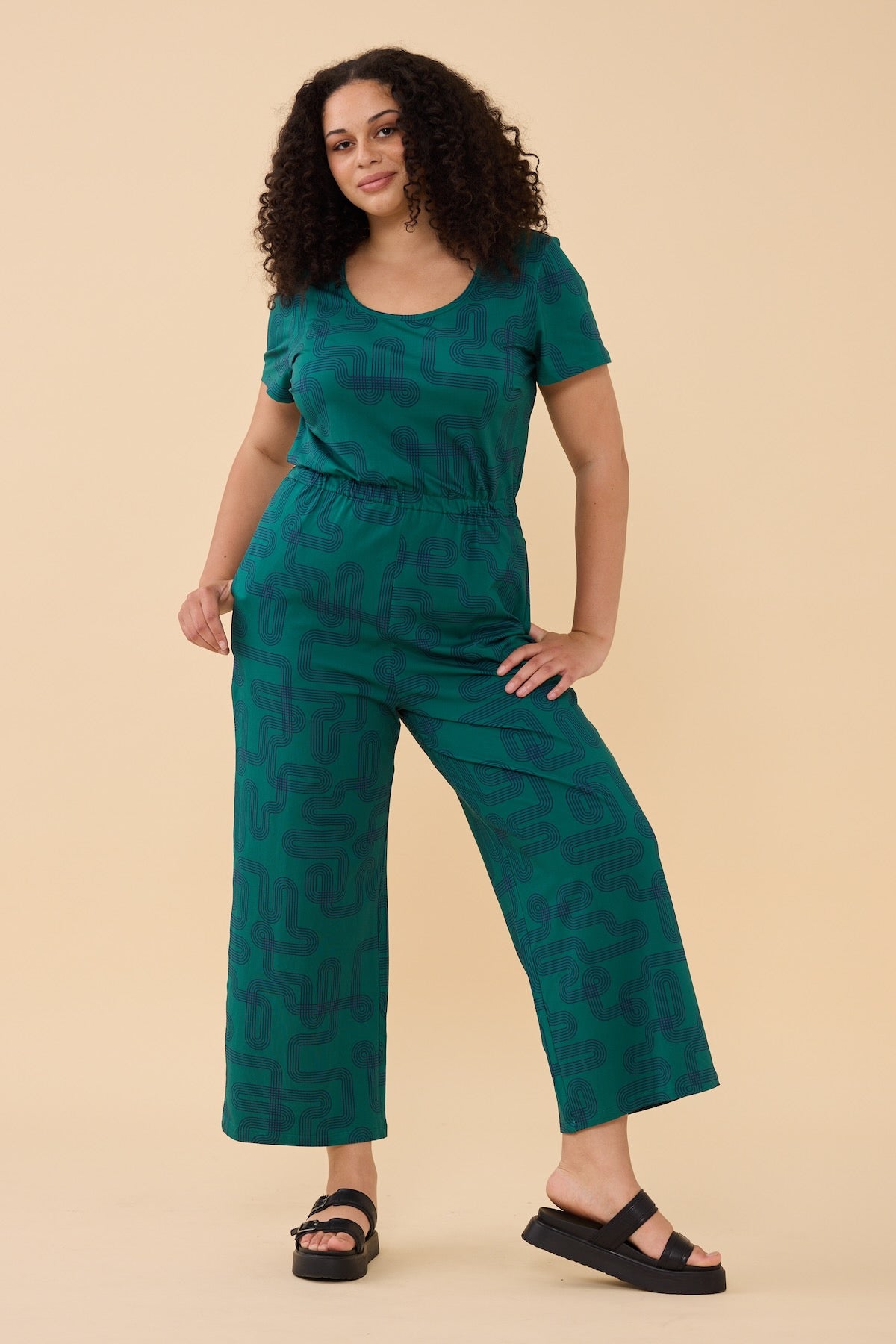 Woman wearing the Frock Me Out Labyrinth Stretch Jumpsuit