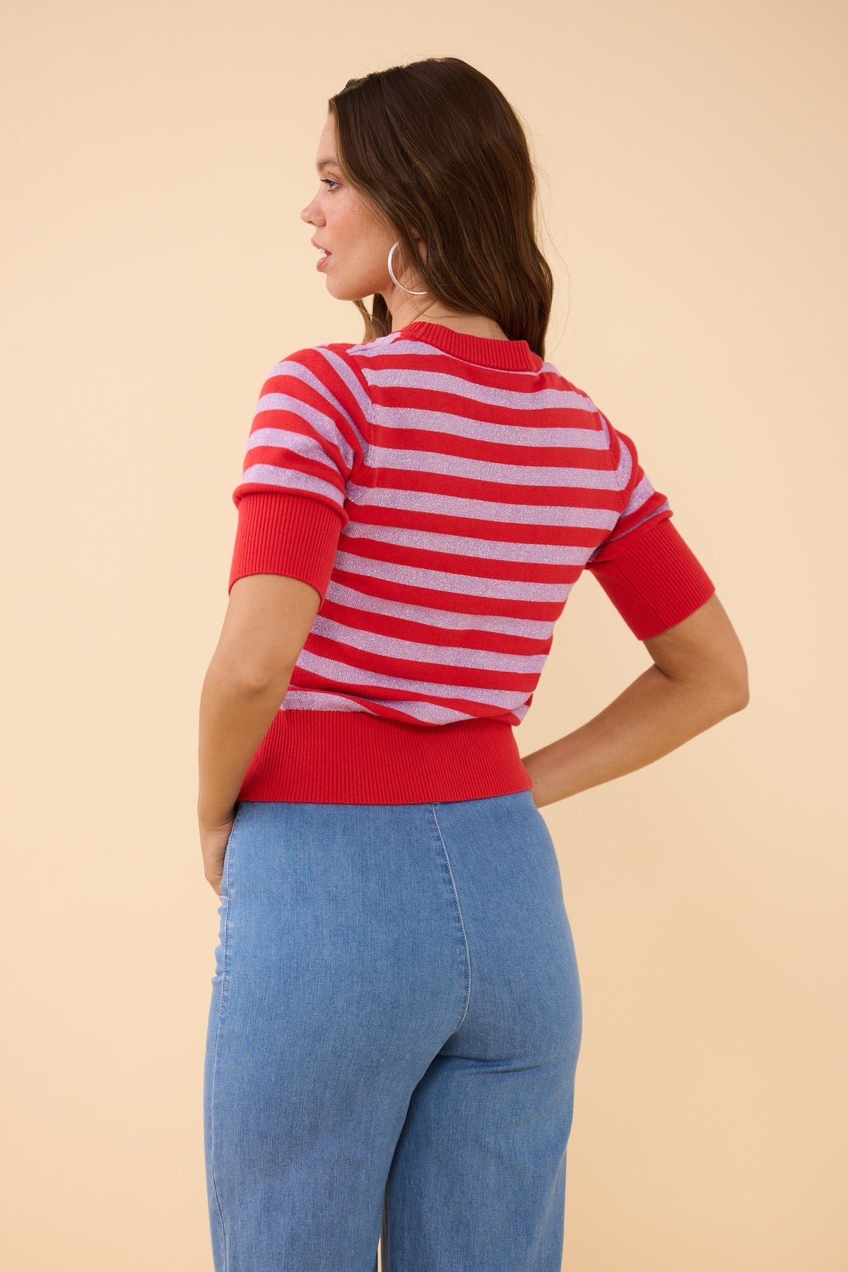 Woman wearing the Frock Me Out RED and DISCO LILAC Stripe Knit 