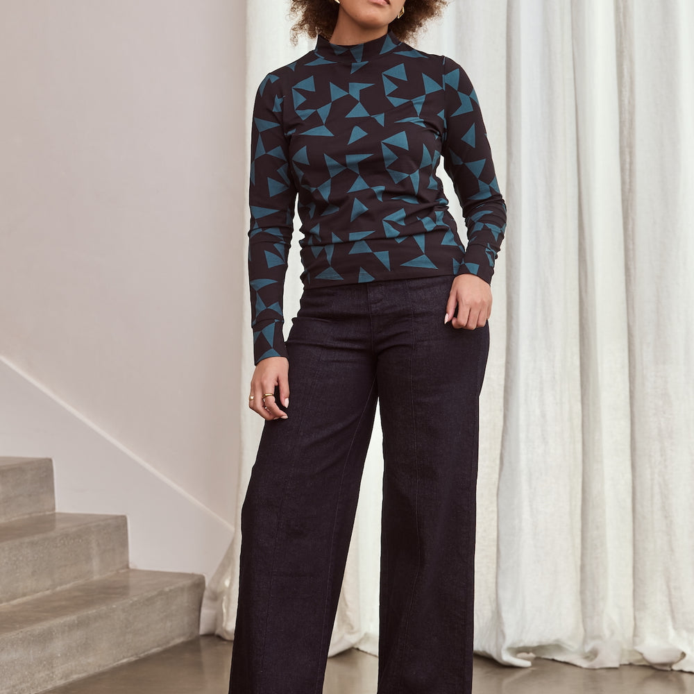 
                      
                        TANGO Mock Neck Top
                      
                    