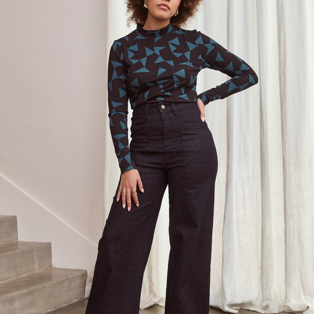
                      
                        TANGO Mock Neck Top
                      
                    