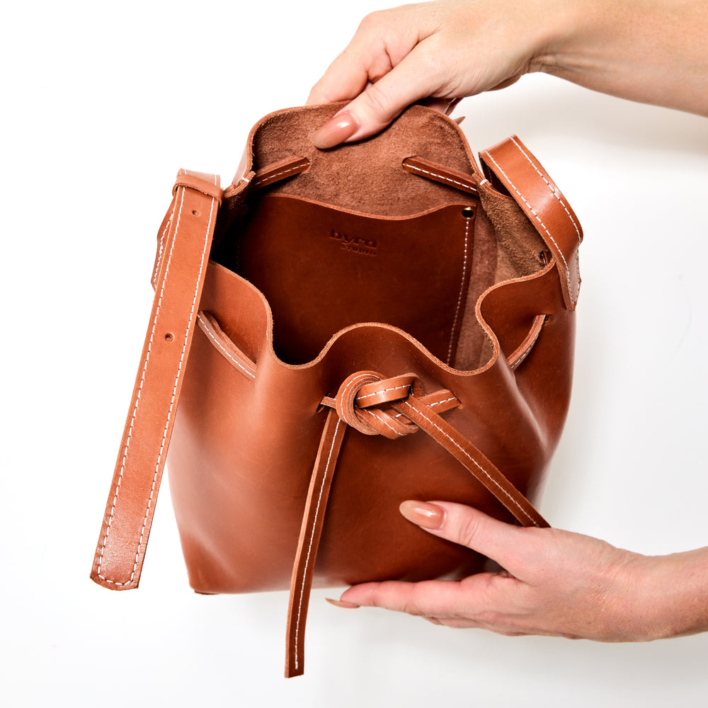 
                      
                        BUCKET LIST Bag by Byrd Studio - Toffee Tan Leather
                      
                    