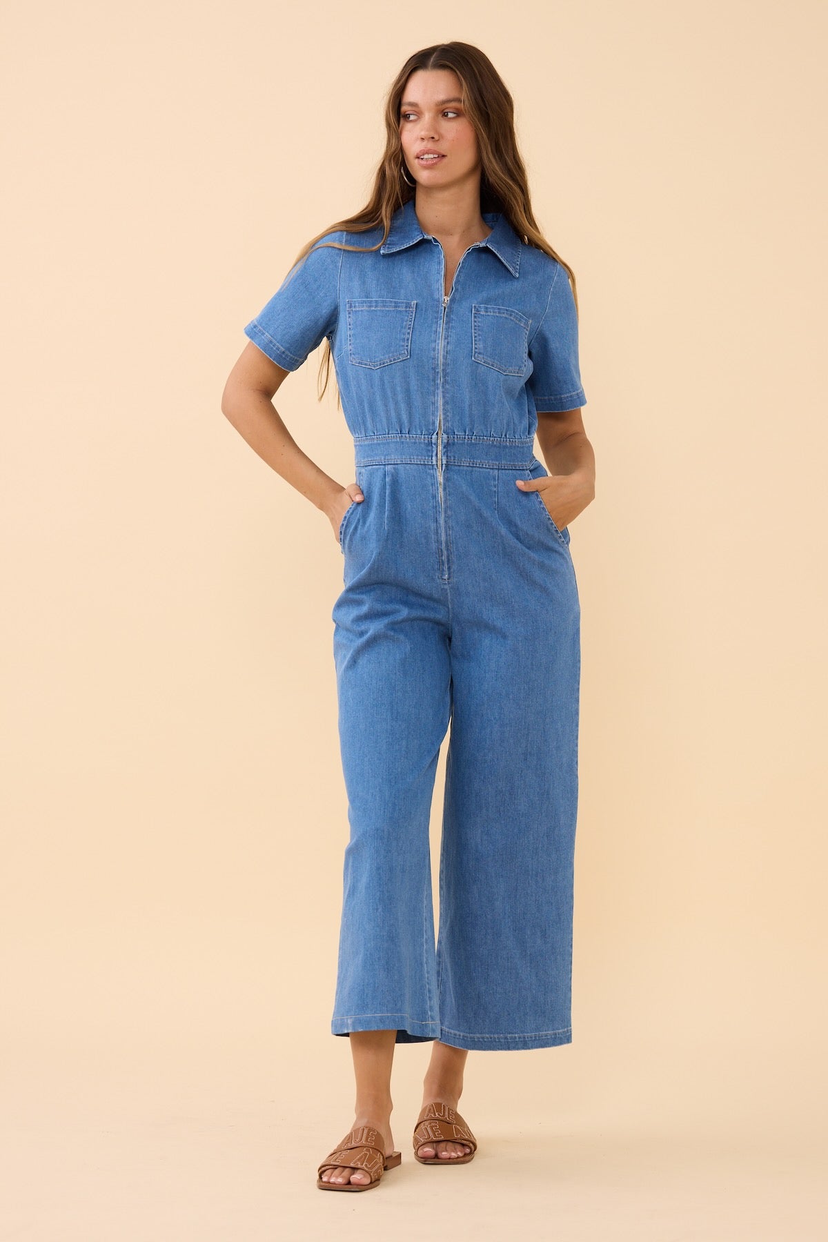 Woman wearing Frock Me Out DENIM Freestyler Jumpsuit (Vintage Wash)