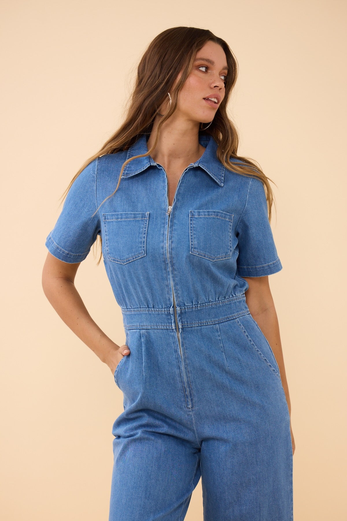 Woman wearing Frock Me Out DENIM Freestyler Jumpsuit (Vintage Wash)