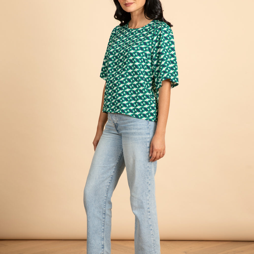 
                      
                        ARCHED Fluted Sleeve Top
                      
                    