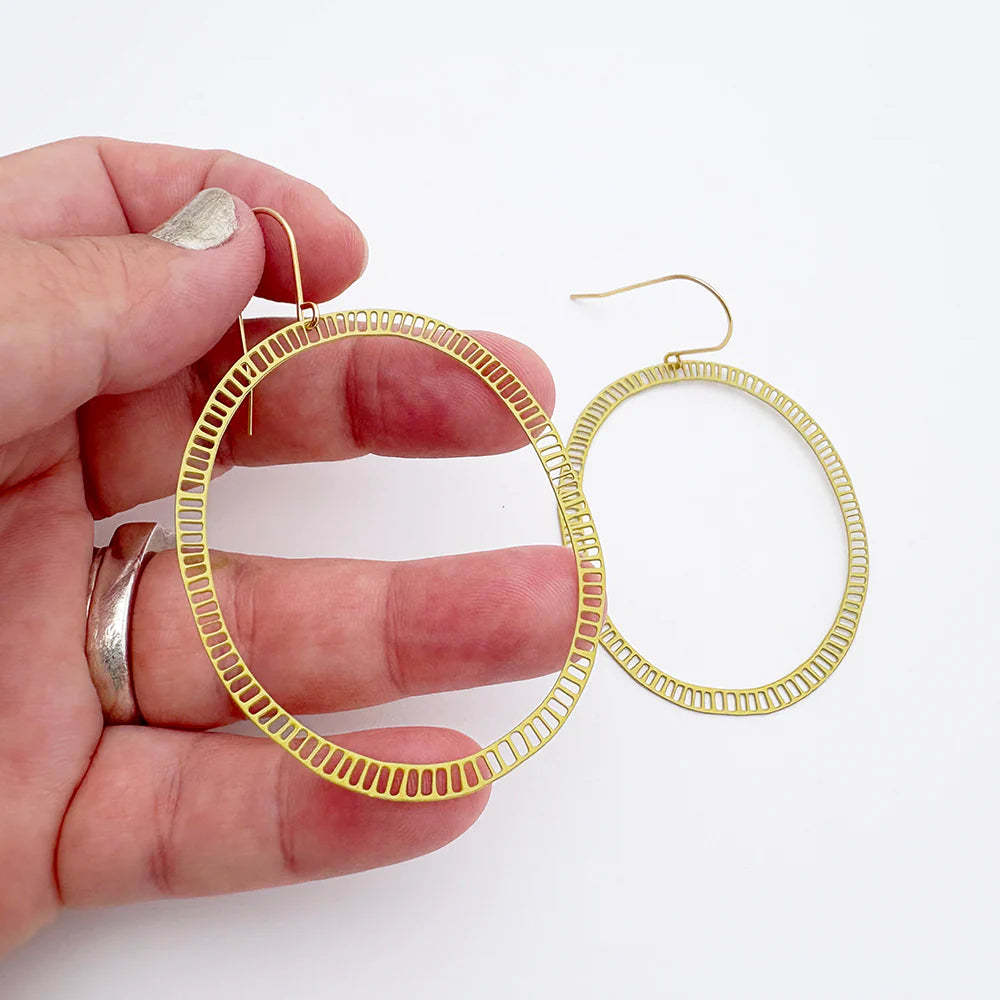 
                      
                        DASH OVAL Earrings in Dijon
                      
                    