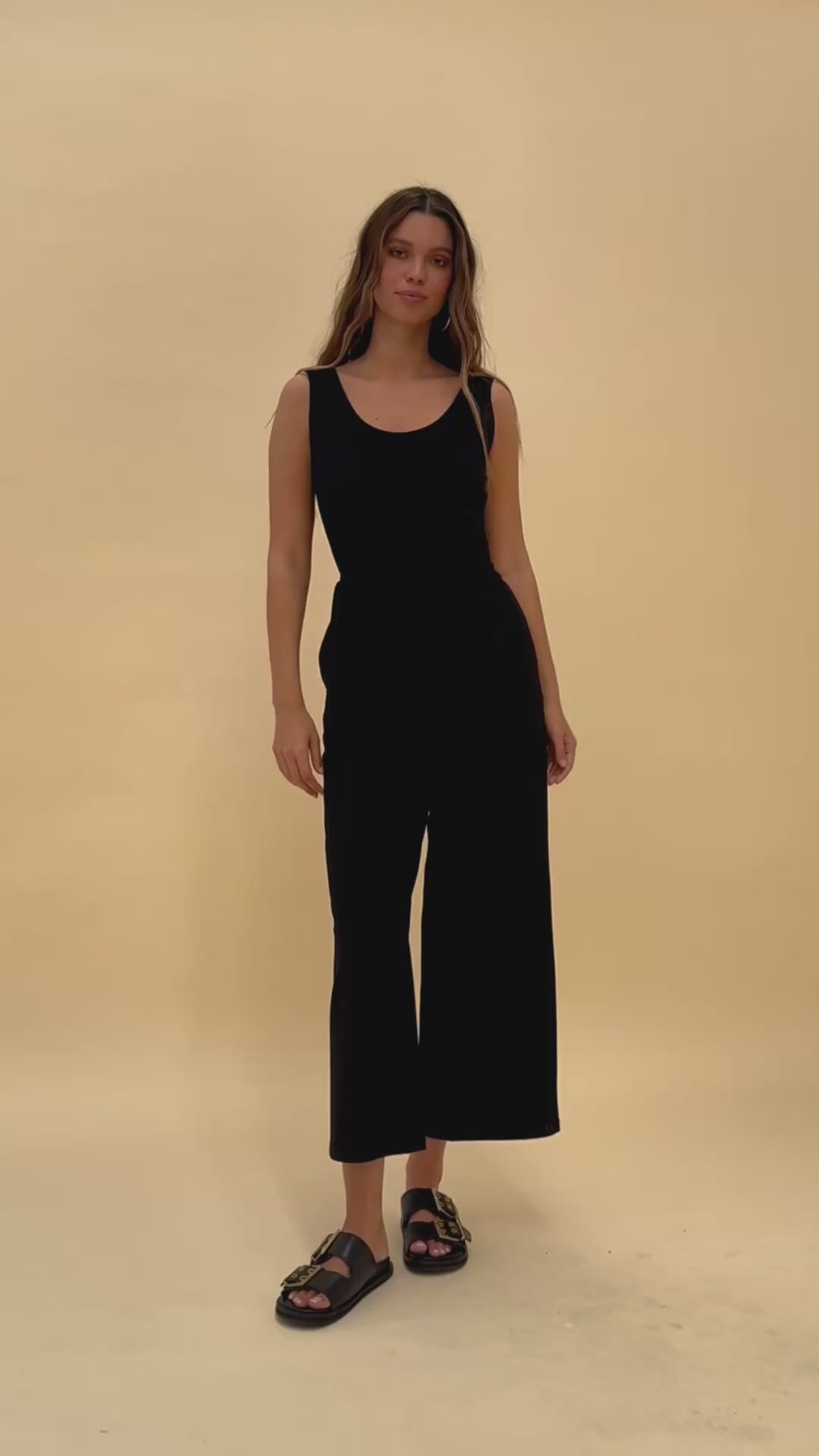 Model wearing the Frock Me Out BLACK Sleeveless Stretch Jumpsuit